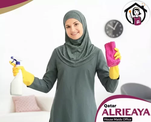 recruitment agency in Doha 051898847 Al Riaaya Smiling housemaid with cleaning supplies representing reliable home cleaning services.